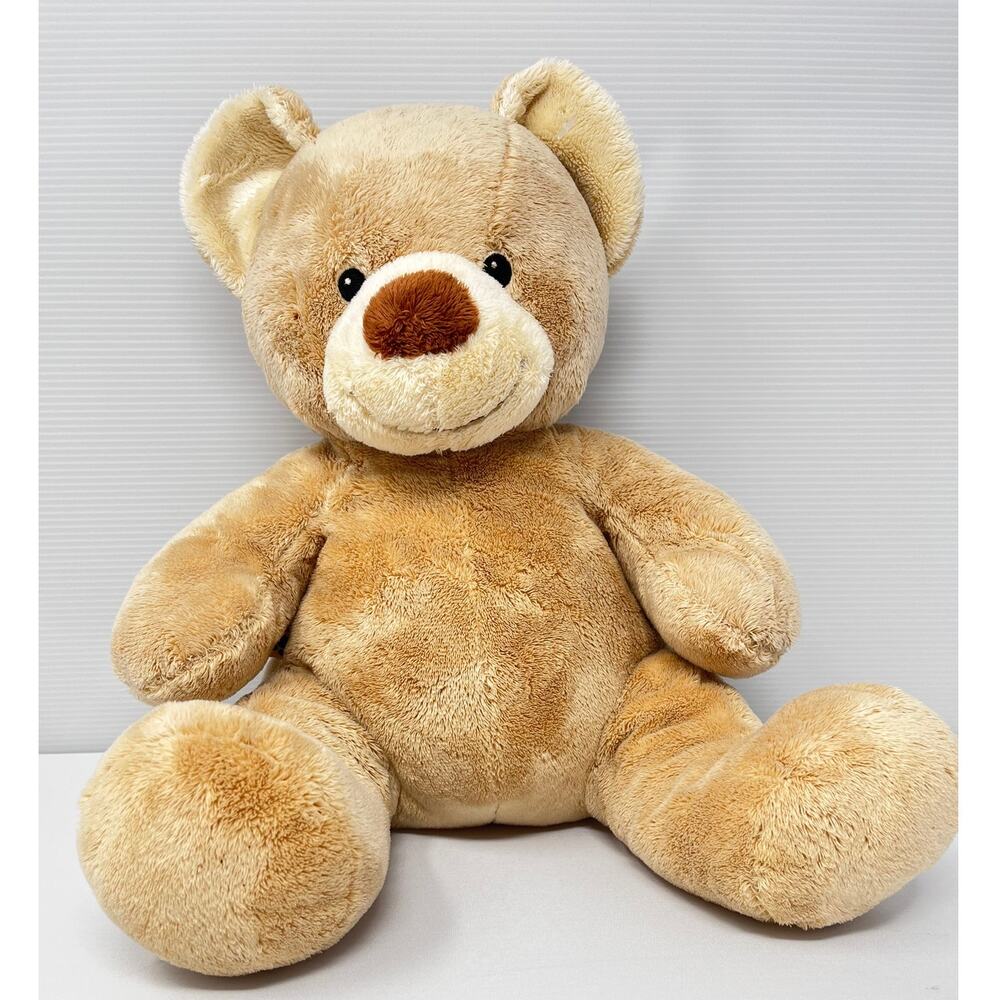 Light Brown Build A Bear Bear size Pre-Owned in good condition has a few stains
